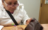 Photo of citizenship student using iPad