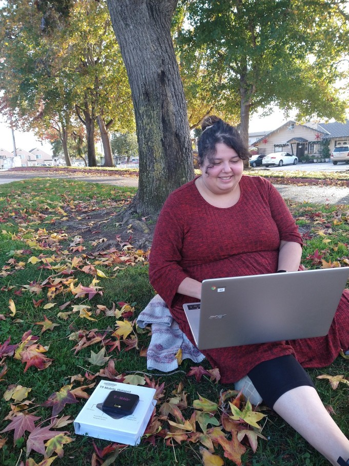 woman with laptop and hotspot