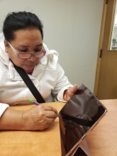 Photo of citizenship student using iPad